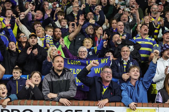 Warrington fans celebrate the win as they book their place in the final at Old Trafford during the Betfred Super League Play-off Semi-Final match Leeds Rhinos vs Warrington Wolves at AMT Headingley Stadium, Leeds, United Kingdom on 25 September 2026

(Photo by Mark Cosgrove/News Images)