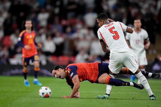 Mikel Merino of Spain is tackled by  Ezri Konsa of England during the UEFA Nations League match England vs Spain at Wembley Stadium, London, United Kingdom on 26 September 2026

(Photo by Maynard Manyowa/News Images)