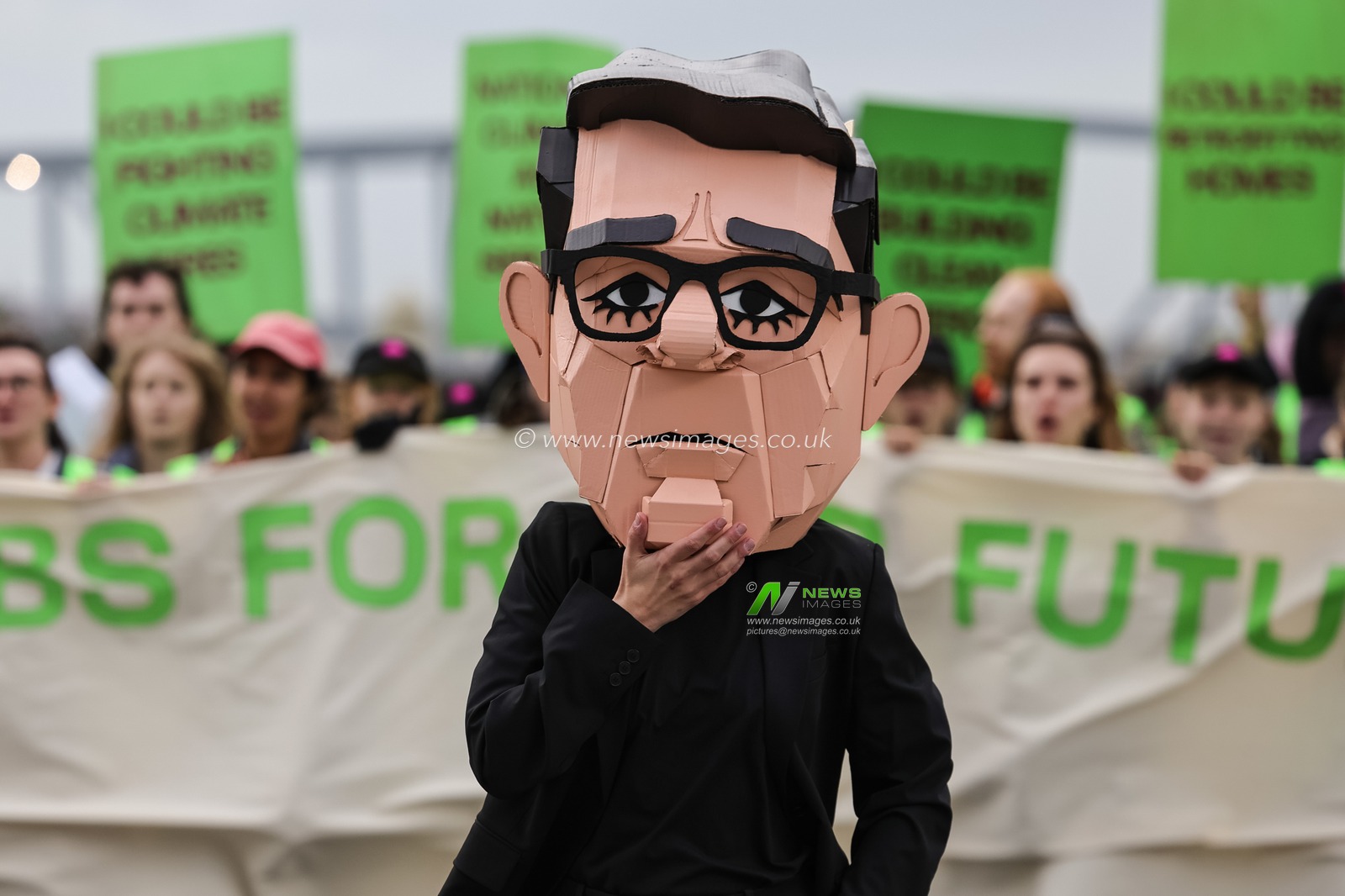 A young activist wearing a Papier-mache Andy Burnham The UK Prime Minister head protests about jobs for our future with colleagues during the Labour Party Annual Conference 2026 at Convention Centre, Liverpool, United Kingdom on 27 September 2026

(Photo by Mark Cosgrove/News Images)