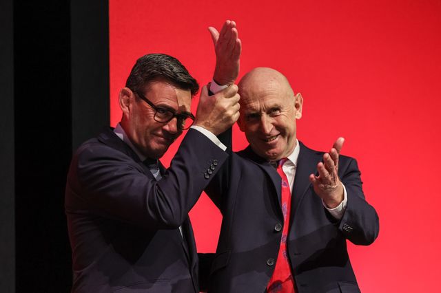 Prime Minister of the United Kingdom Andy Burnham lifts the hands of Chancellor of the Exchequer John Healey MP after his speech during the Labour Party Annual Conference Day Two at Convention Centre, Liverpool, United Kingdom on 28 September 2026

(Photo by Mark Cosgrove/News Images)