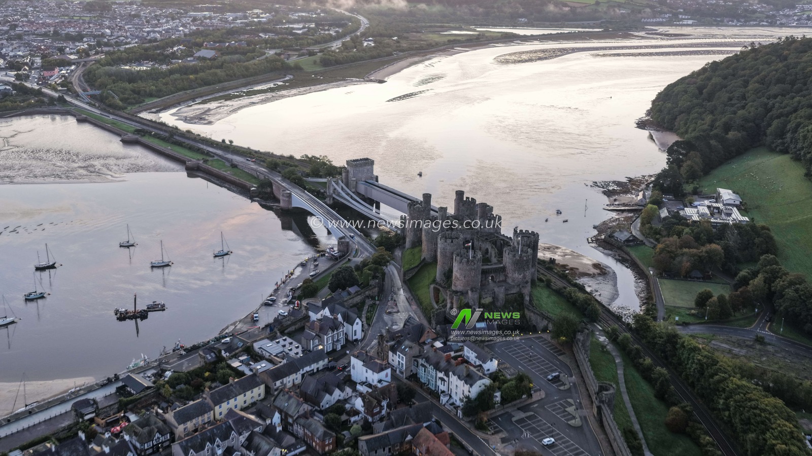 A spectacular sunrise breaks over the historic Conwy Castle, bathing the medieval fortress and surrounding landscape in dramatic golden light in Conwy, Wales, United Kingdom, on 3 October 2026.

(Photo by Mark Cosgrove/News Images)