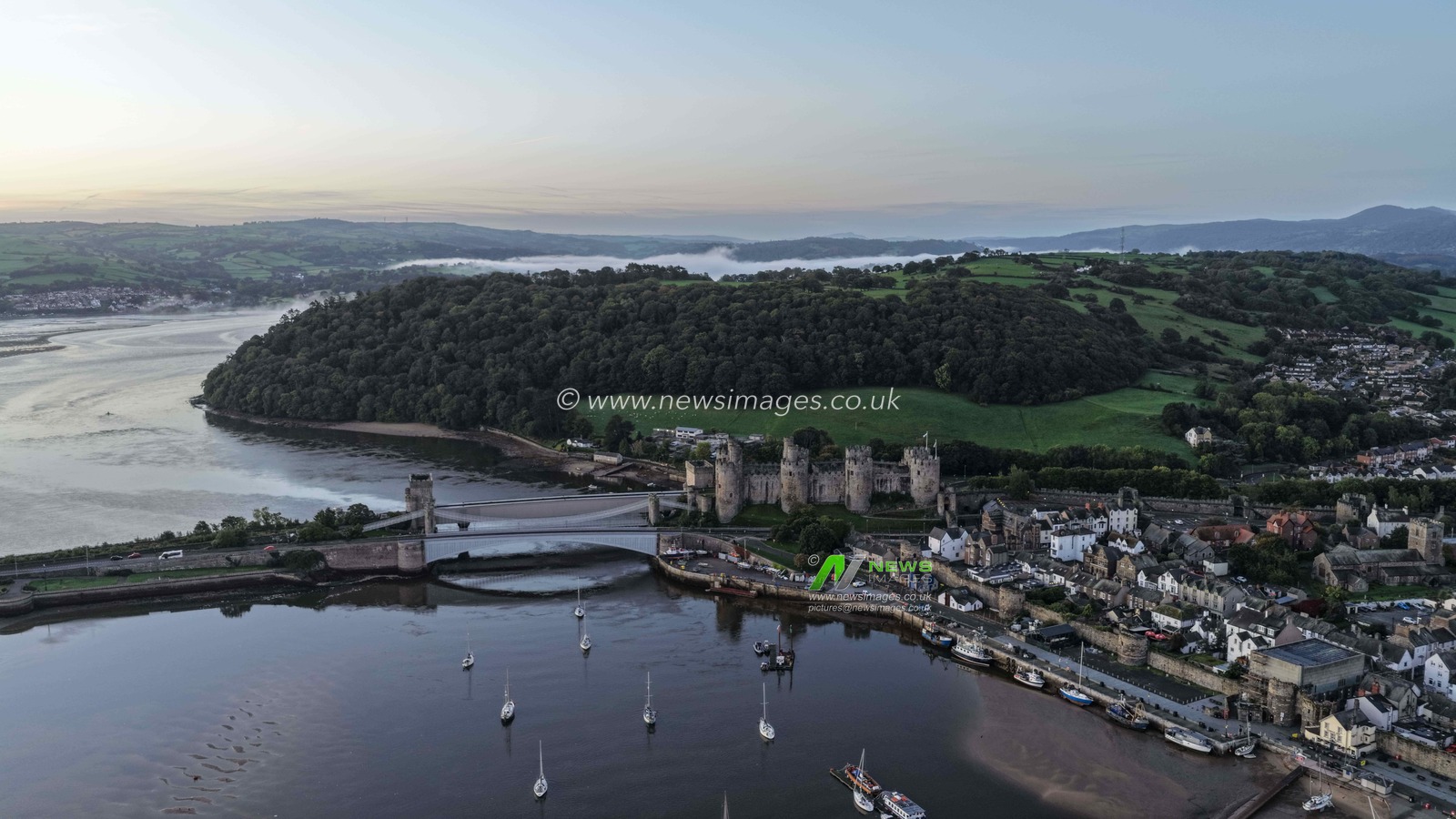 A spectacular sunrise breaks over the historic Conwy Castle, bathing the medieval fortress and surrounding landscape in dramatic golden light in Conwy, Wales, United Kingdom, on 3 October 2026.

(Photo by Mark Cosgrove/News Images)