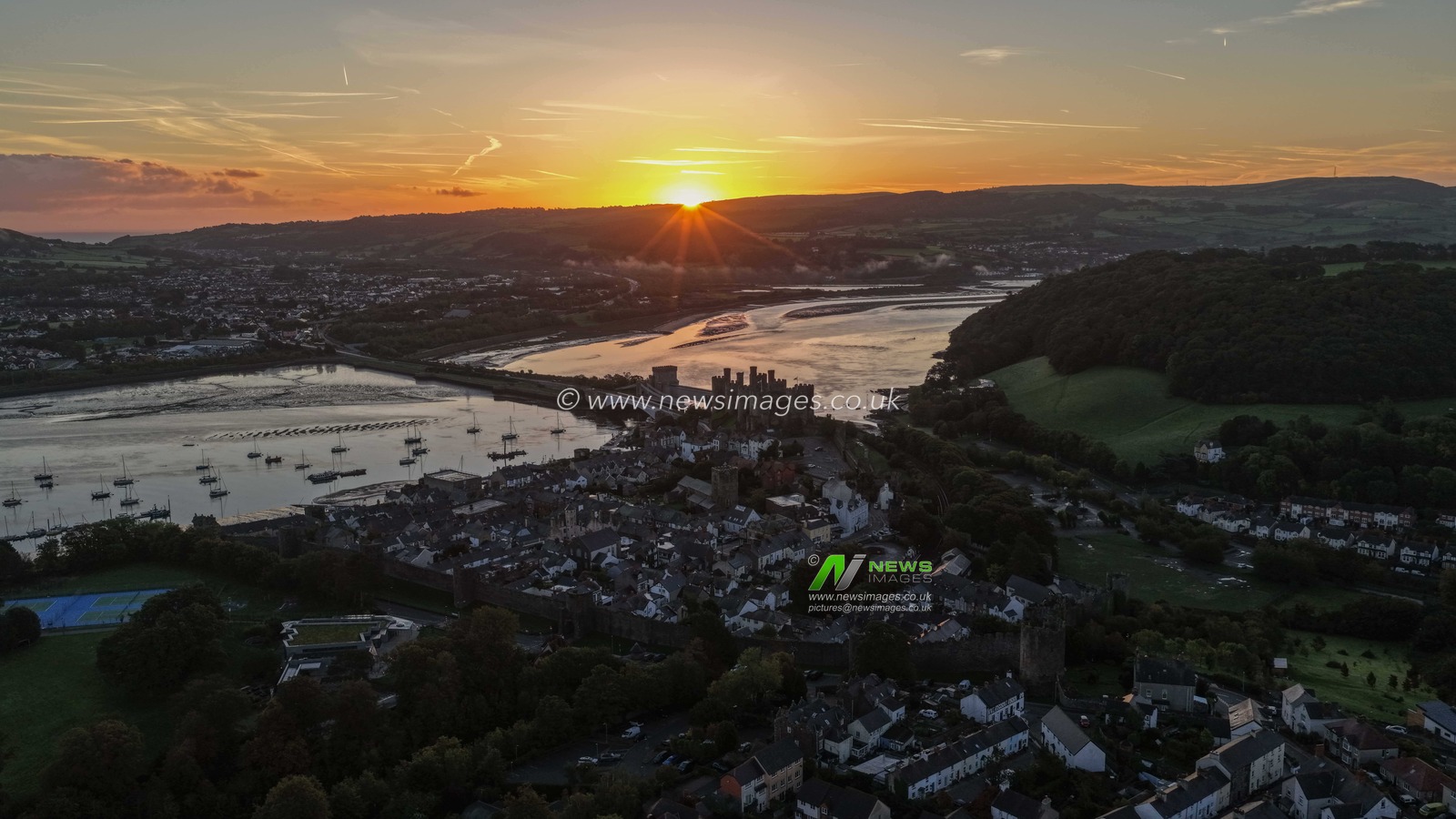 A spectacular sunrise breaks over the historic Conwy Castle, bathing the medieval fortress and surrounding landscape in dramatic golden light in Conwy, Wales, United Kingdom, on 3 October 2026.

(Photo by Mark Cosgrove/News Images)
