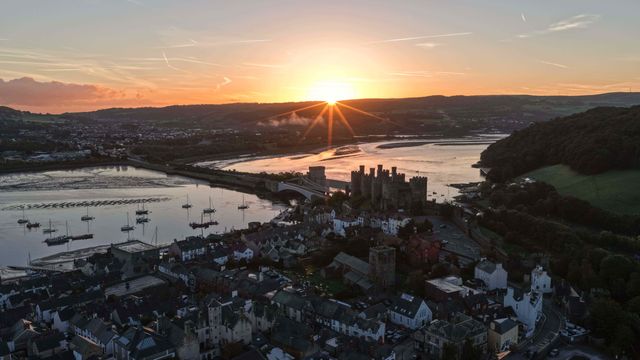Sunrise over Conwy Castle