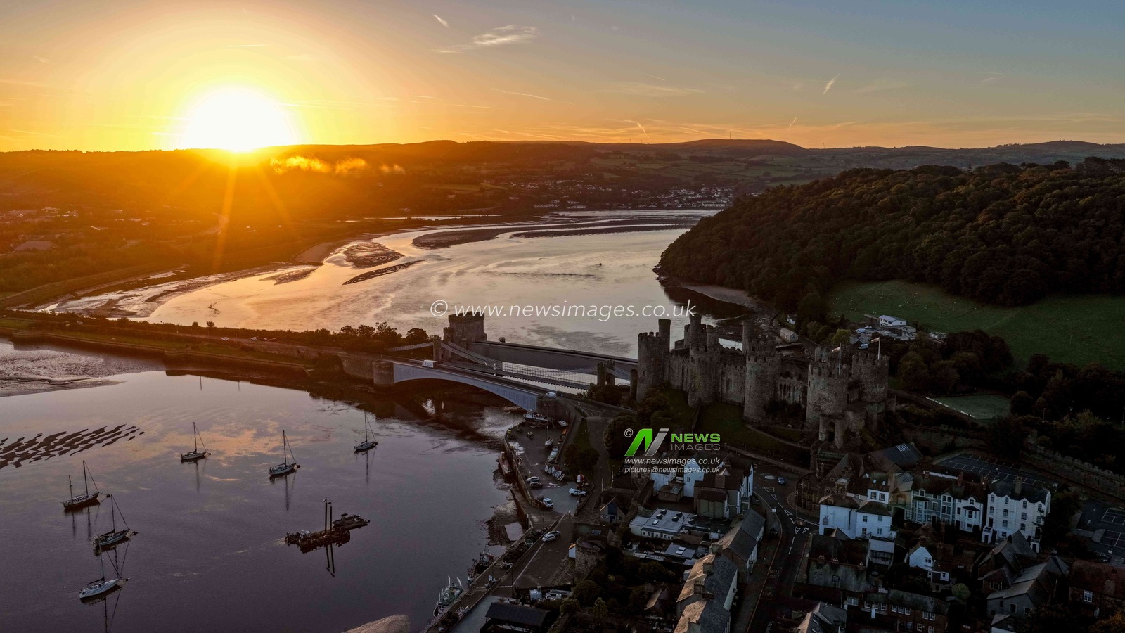 A spectacular sunrise breaks over the historic Conwy Castle, bathing the medieval fortress and surrounding landscape in dramatic golden light in Conwy, Wales, United Kingdom, on 3 October 2026.

(Photo by Mark Cosgrove/News Images)