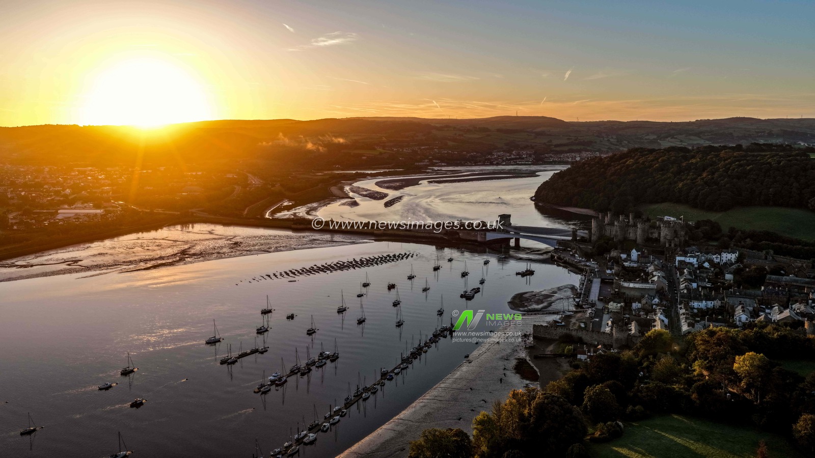 A spectacular sunrise breaks over the historic Conwy Castle, bathing the medieval fortress and surrounding landscape in dramatic golden light in Conwy, Wales, United Kingdom, on 3 October 2026.

(Photo by Mark Cosgrove/News Images)