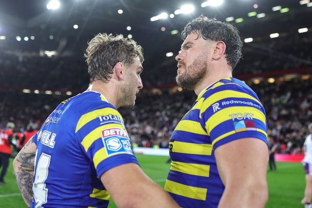 Sam Powell of Warrington Wolves embraces Joe Philbin of Warrington Wolves during the Betfred Super League Grand Final match Warrington Wolves vs Wakefield Trinity at Old Trafford, Manchester, United Kingdom on 03 October 2026

(Photo by Mark Cosgrove/News Images)