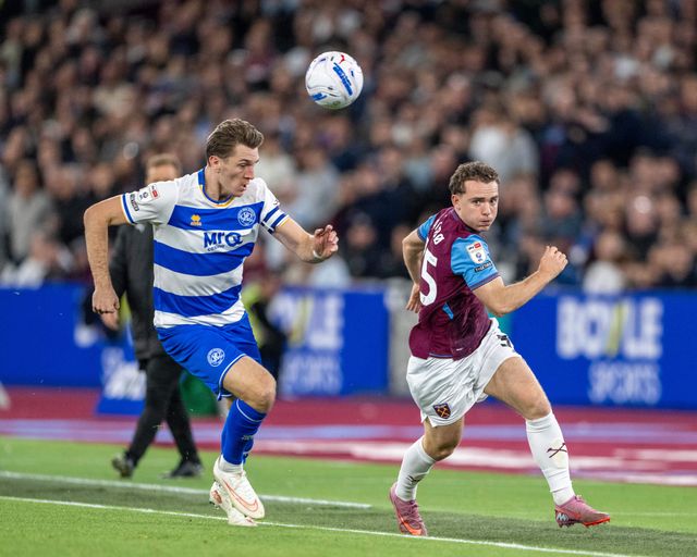 Edvin Austbø of West Ham United breaks forward pursued by Jimmy Dunne (c) of QPR during the Sky Bet Championship match West Ham United vs Queens Park Rangers at London Stadium, London, United Kingdom on 09 October 2026

(Photo by Mike Turner/News Images)