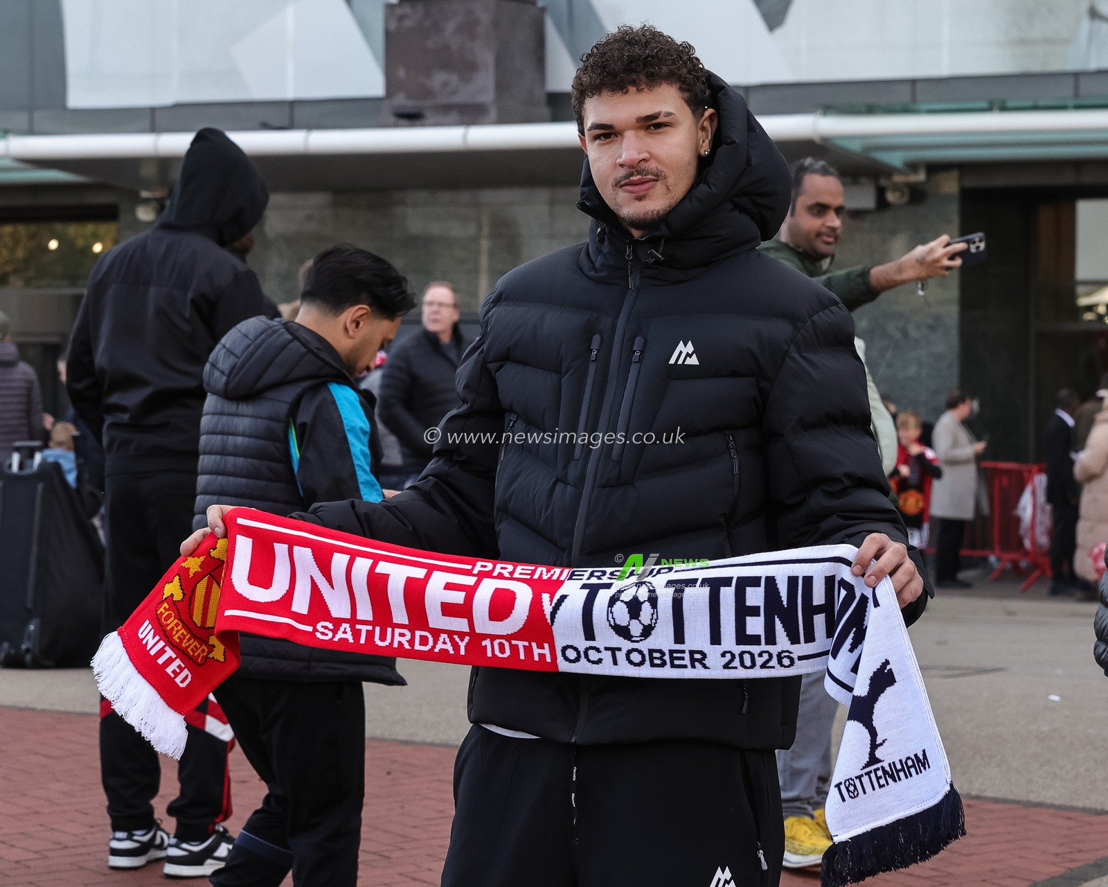 Manchester United fans pose for a selfie during the Premier League match Manchester United vs Tottenham Hotspur at Old Trafford, Manchester, United Kingdom on 10 October 2026

(Photo by Mark Cosgrove/News Images)