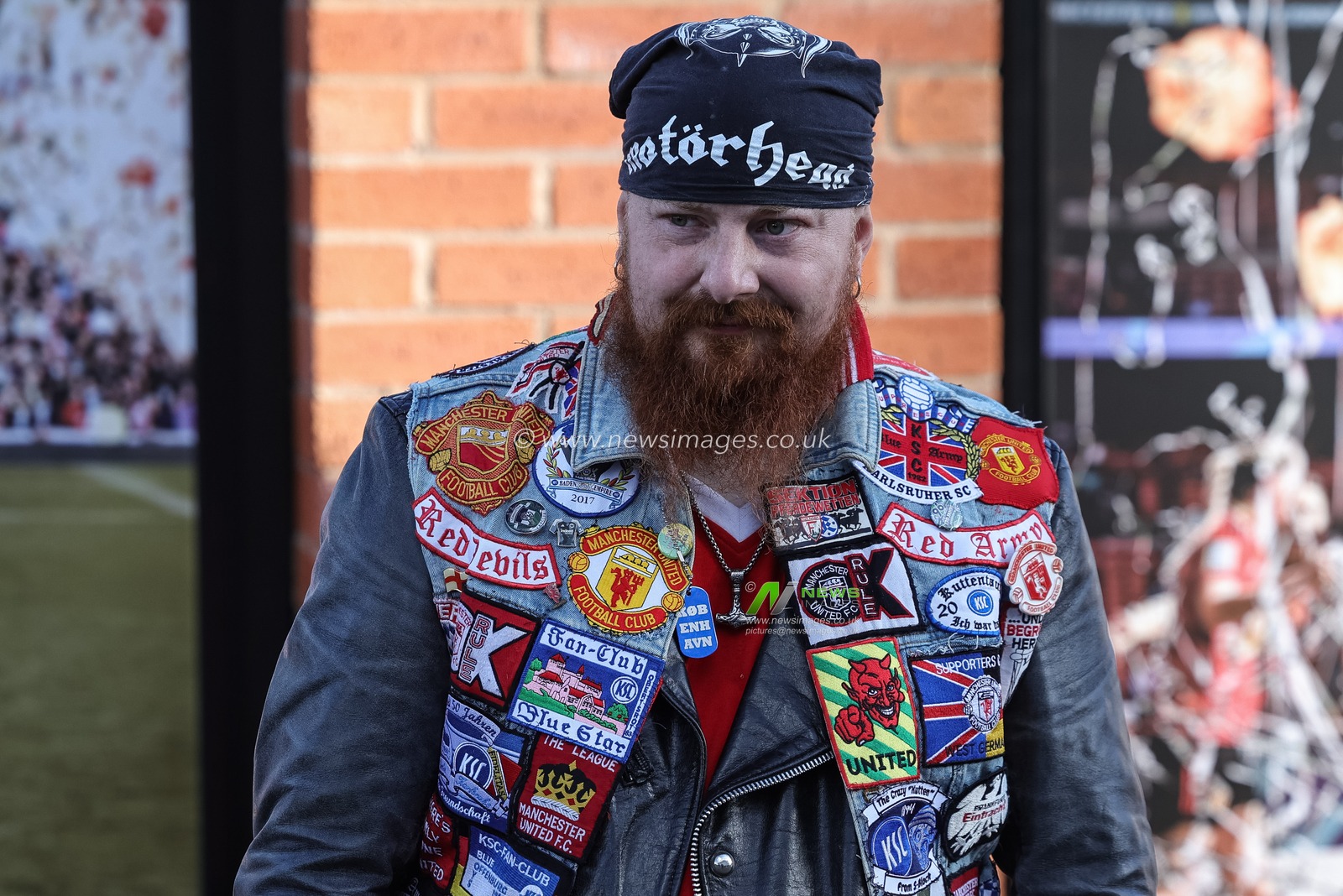 A Manchester United fan with a denim jacket covered in Man Utd badges during the Premier League match Manchester United vs Tottenham Hotspur at Old Trafford, Manchester, United Kingdom on 10 October 2026

(Photo by Mark Cosgrove/News Images)