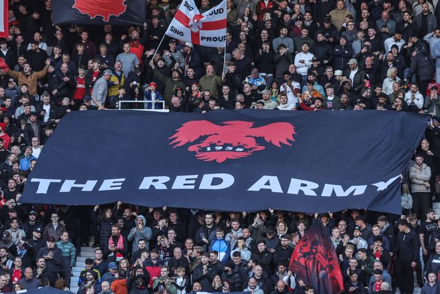 Manchester United fans hold up flags before the Premier League match Manchester United vs Tottenham Hotspur at Old Trafford, Manchester, United Kingdom on 10 October 2026

(Photo by Mark Cosgrove/News Images)