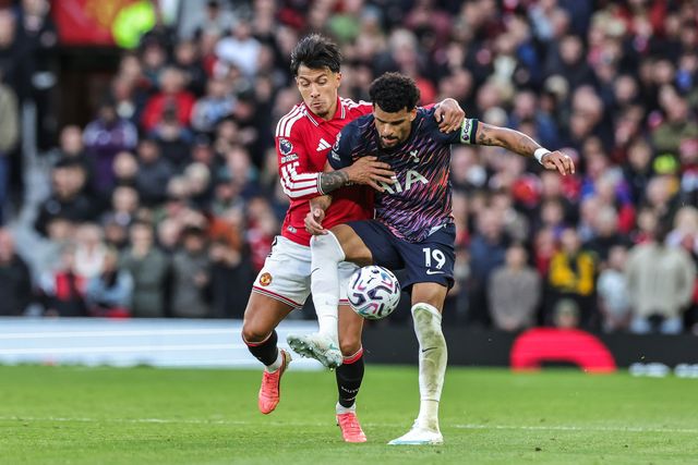 Lisandro Martinez of Manchester United and Dominic Solanke of Tottenham Hotspur battle for the ball during the Premier League match Manchester United vs Tottenham Hotspur at Old Trafford, Manchester, United Kingdom on 10 October 2026

(Photo by Mark Cosgrove/News Images)