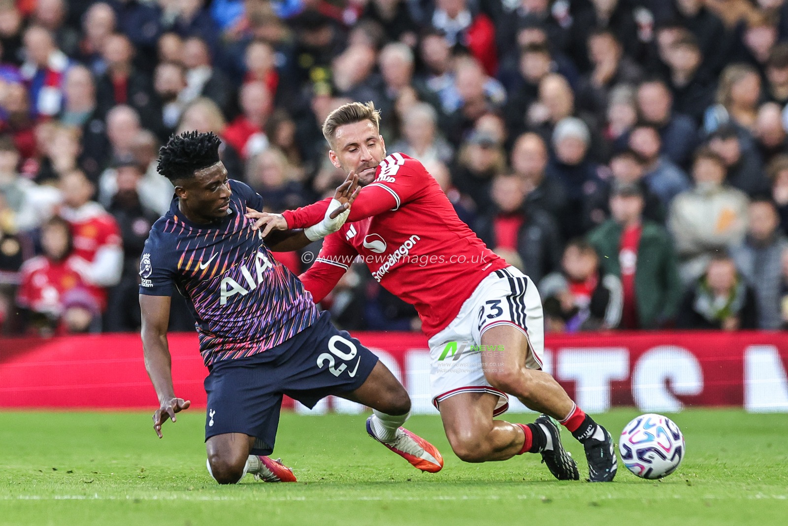Mohammed Kudus of Tottenham Hotspur and Luke Shaw of Manchester United battle for the ball during the Premier League match Manchester United vs Tottenham Hotspur at Old Trafford, Manchester, United Kingdom on 10 October 2026

(Photo by Mark Cosgrove/News Images)