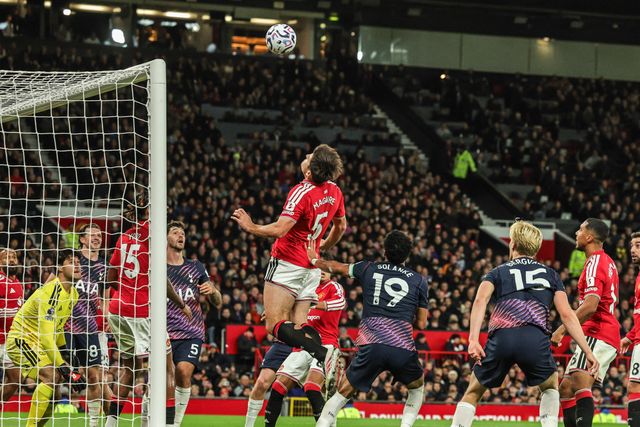 Harry Maguire of Manchester United heads the ball clear during the Premier League match Manchester United vs Tottenham Hotspur at Old Trafford, Manchester, United Kingdom on 10 October 2026

(Photo by Mark Cosgrove/News Images)
