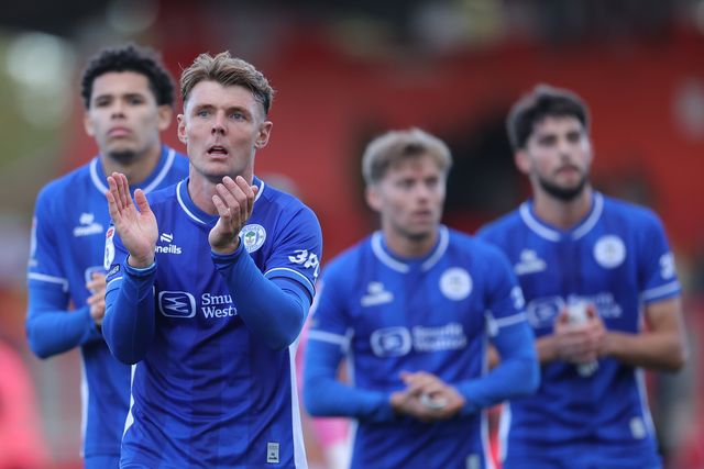 Wigan players applaud away support at full time during the Sky Bet League One match Stevenage vs Wigan Athletic at Lamex Stadium, Stevenage, United Kingdom on 10 October 2026

(Photo by Harvey Murphy/News Images)