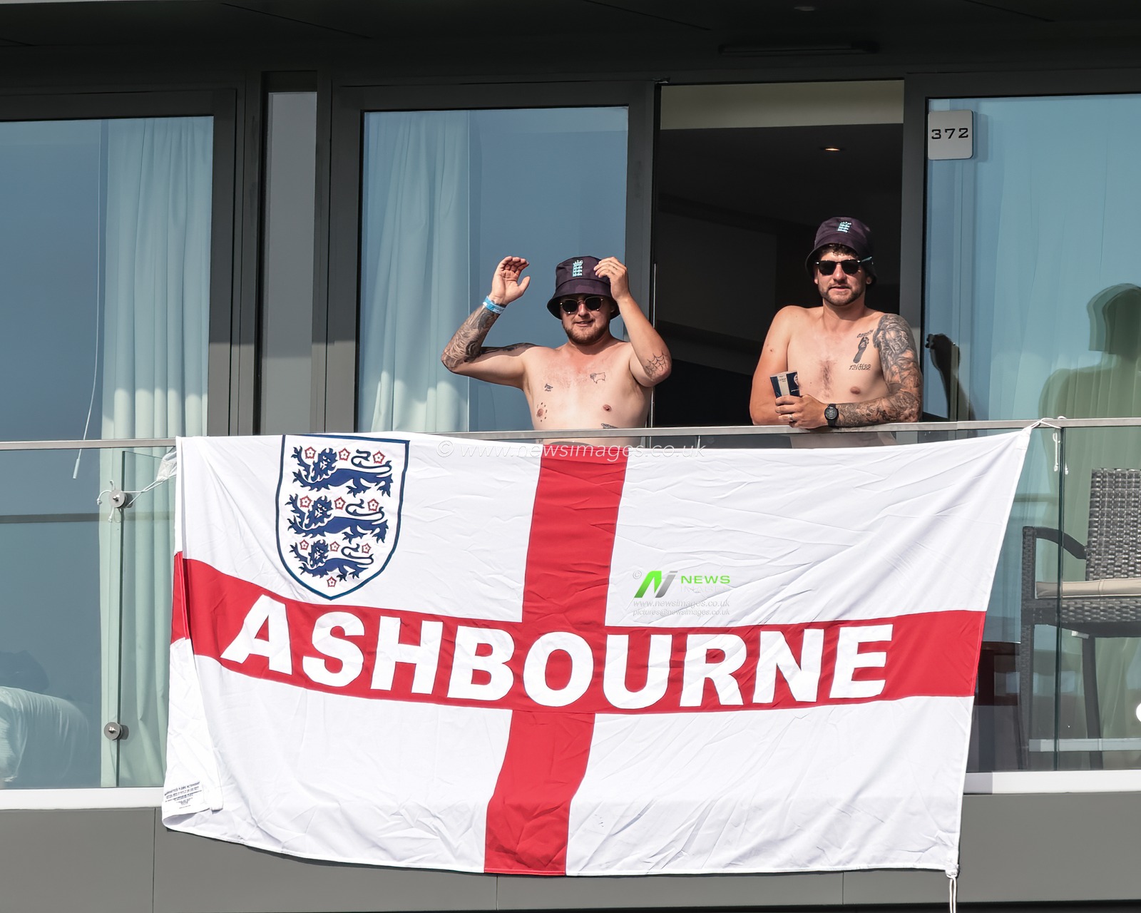 Two England fans look on as Stokes and Root keep up the run rate during the 4th Rothesay Test Match match Day 3 England vs India at Old Trafford Cricket Ground, Manchester, United Kingdom, 25th July 2025

(Photo by Mark Cosgrove/News Images)
