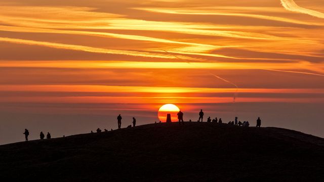 Sunrise hikers walk to the summit of Mam Tor as they watch the sunrise and admire the cloud inversion in the Hope Valley at Mam Tor in the Peak District at Mam Tor, Castleton, United Kingdom on 21 March 2026

(Photo by Mark Cosgrove/News Images)