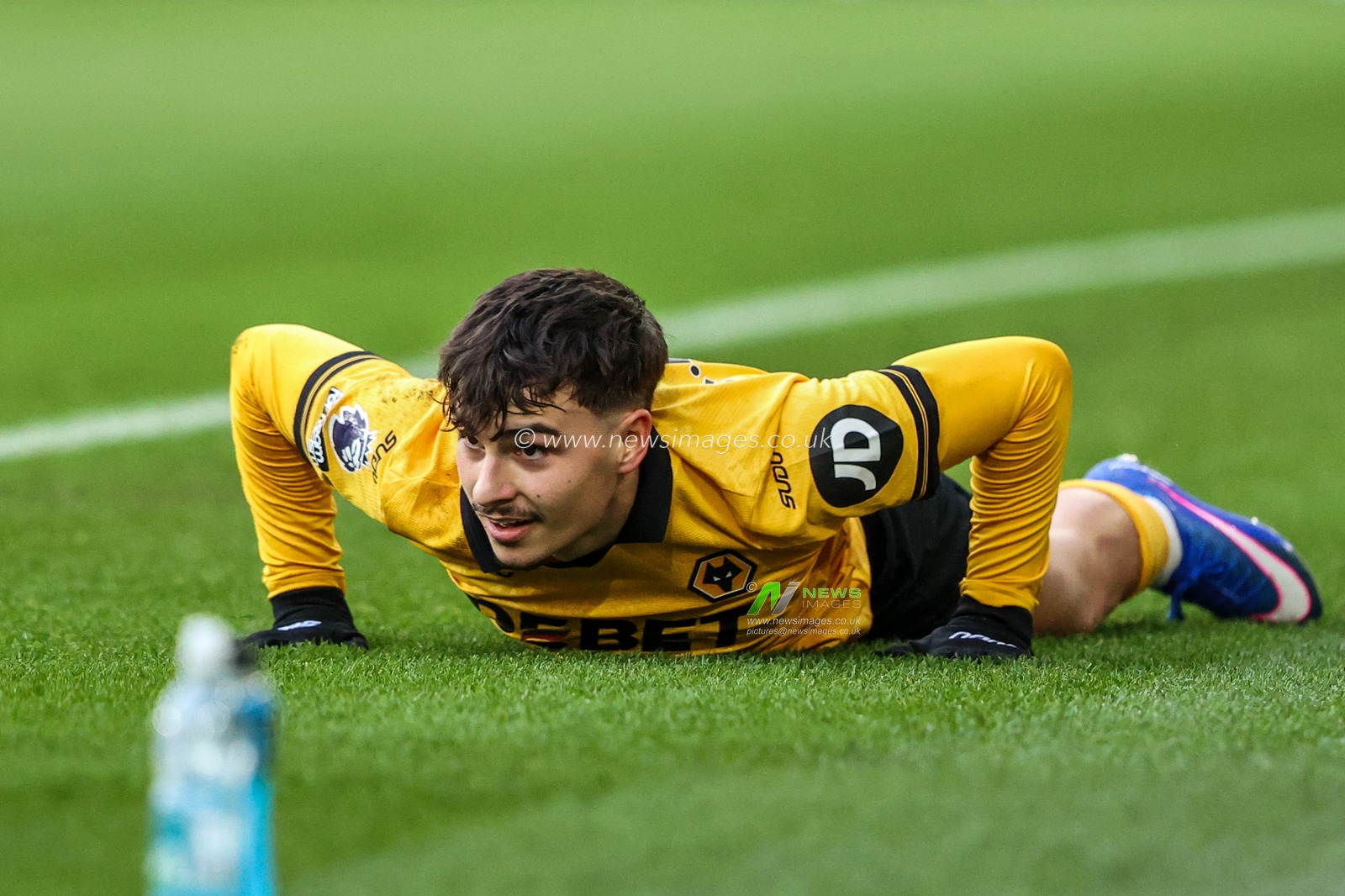 Rodrigo Gomes of Wolverhampton Wanderers reacts after being taken down during the Premier League match Wolverhampton Wanderers vs Bournemouth at Molineux, Wolverhampton, United Kingdom, 31st January 2026

(Photo by Alfie Cosgrove/News Images)
