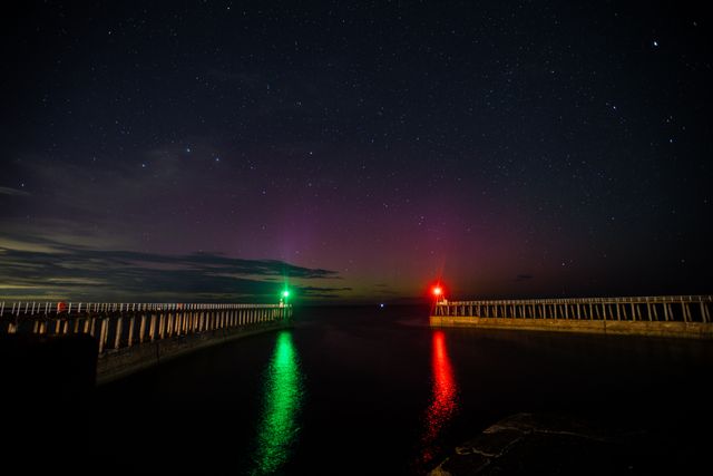 Northern Lights also known as Aurora Borealis shines over Whitby