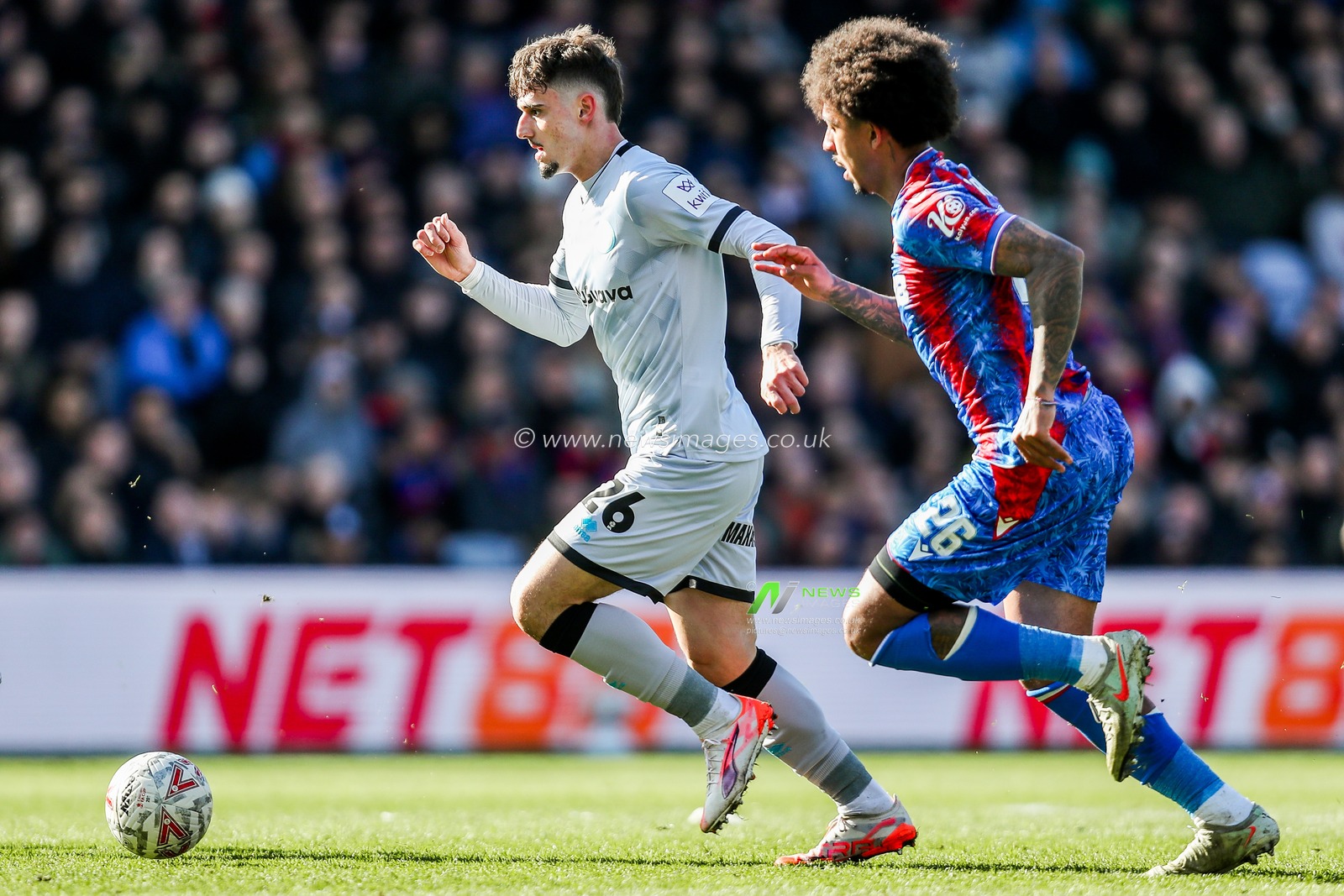 Mihailo Ivanovic of Millwall is put under pressure by Chris Richards of Crystal Palace during the Emirates FA Cup 5th Round match Crystal Palace vs Millwall at Selhurst Park, London, United Kingdom, 1st March 2025

(Photo by Izzy Poles/News Images)