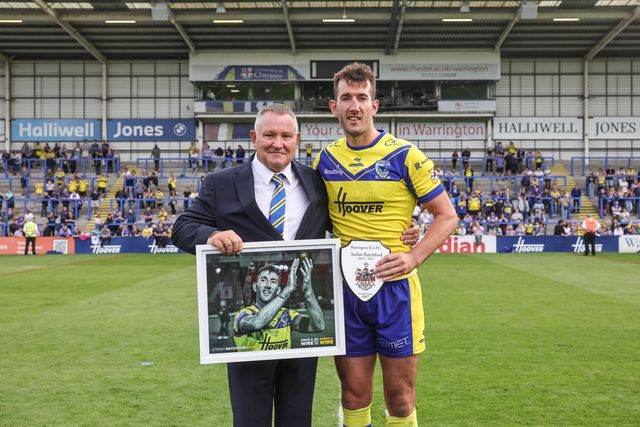 Warrington Wolves Chairman Stuart Middleton presents Stefan Ratchford of Warrington Wolves with a picture and a plaque on his final home game as he announces his retirement during the Betfred Super League Round 25 match Warrington Wolves vs Leigh Leopards at Halliwell Jones Stadium, Warrington, United Kingdom, 6th September 2025

(Photo by Mark Cosgrove/News Images)