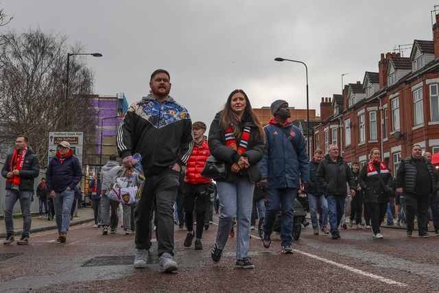 Manchester United fans make their way to Old Trafford during the Premier League match Manchester United vs Fulham at Old Trafford, Manchester, United Kingdom, 1st February 2026

(Photo by Mark Cosgrove/News Images)