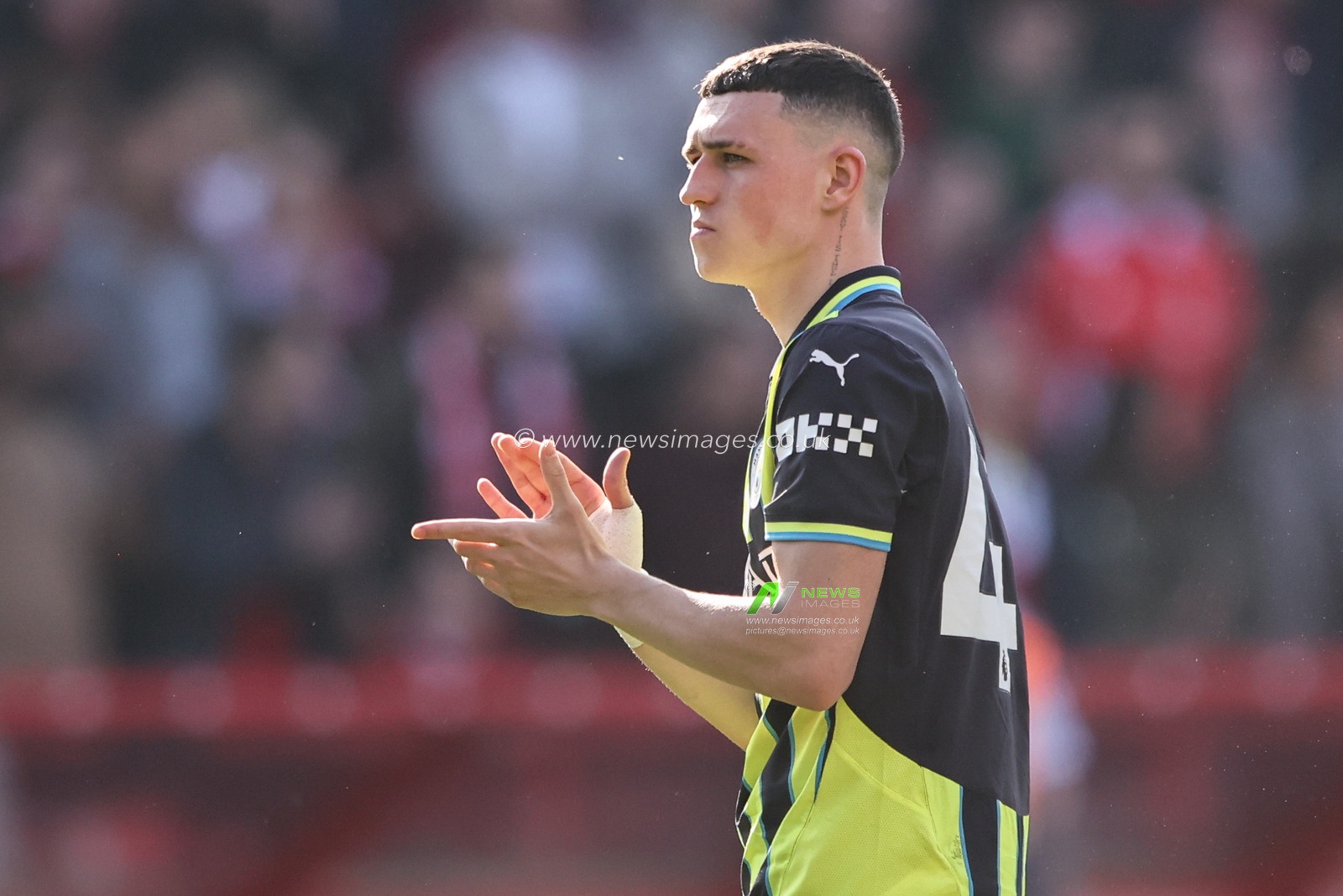 Phil Foden of Manchester City applauds the fans after the game during the Premier League match Nottingham Forest vs Manchester City at City Ground, Nottingham, United Kingdom, 8th March 2025

(Photo by Alfie Cosgrove/News Images)