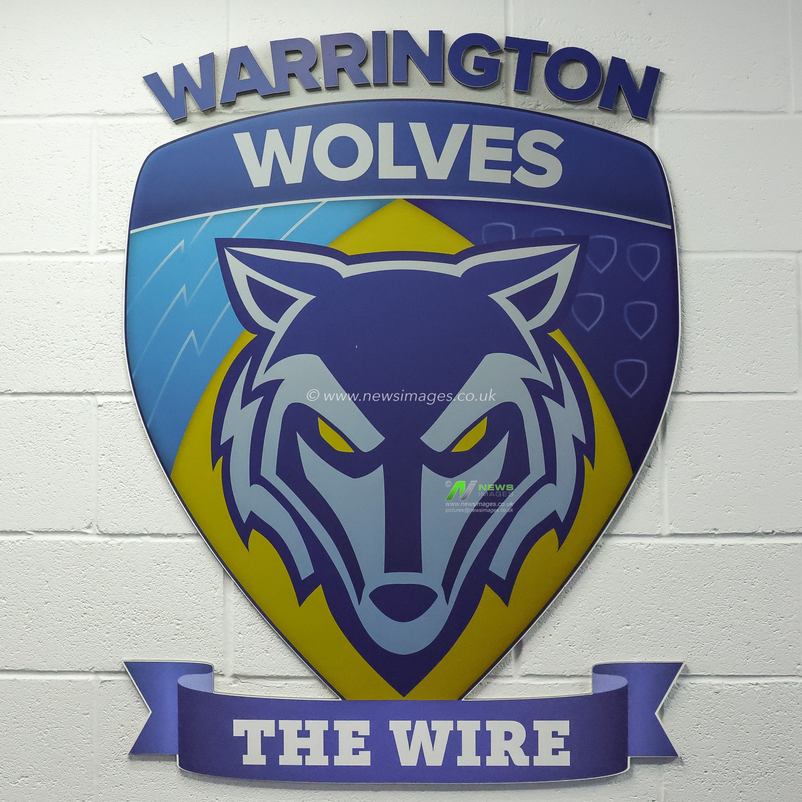 Warrington Wolves crest on the wall near the tunnel during the Betfred Challenge Cup round 4 match Goole Vikings vs Warrington Wolves at The Halliwell Jones Stadium, Warrington, United Kingdom on 14 March 2026

(Photo by Mark Cosgrove/News Images)