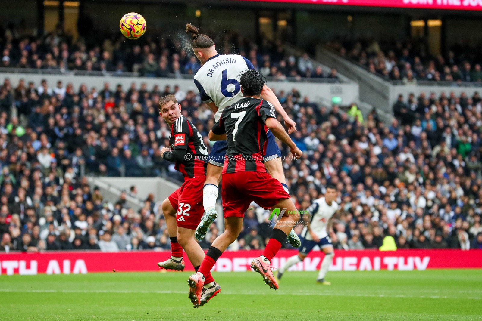 Radu DrÄƒguÈ™in of Tottenham Hotspur heads the ball on goal during the Premier League match Tottenham Hotspur vs Fulham at Tottenham Hotspur Stadium, London, United Kingdom, 1st December 2024

(Photo by Izzy Poles/News Images)