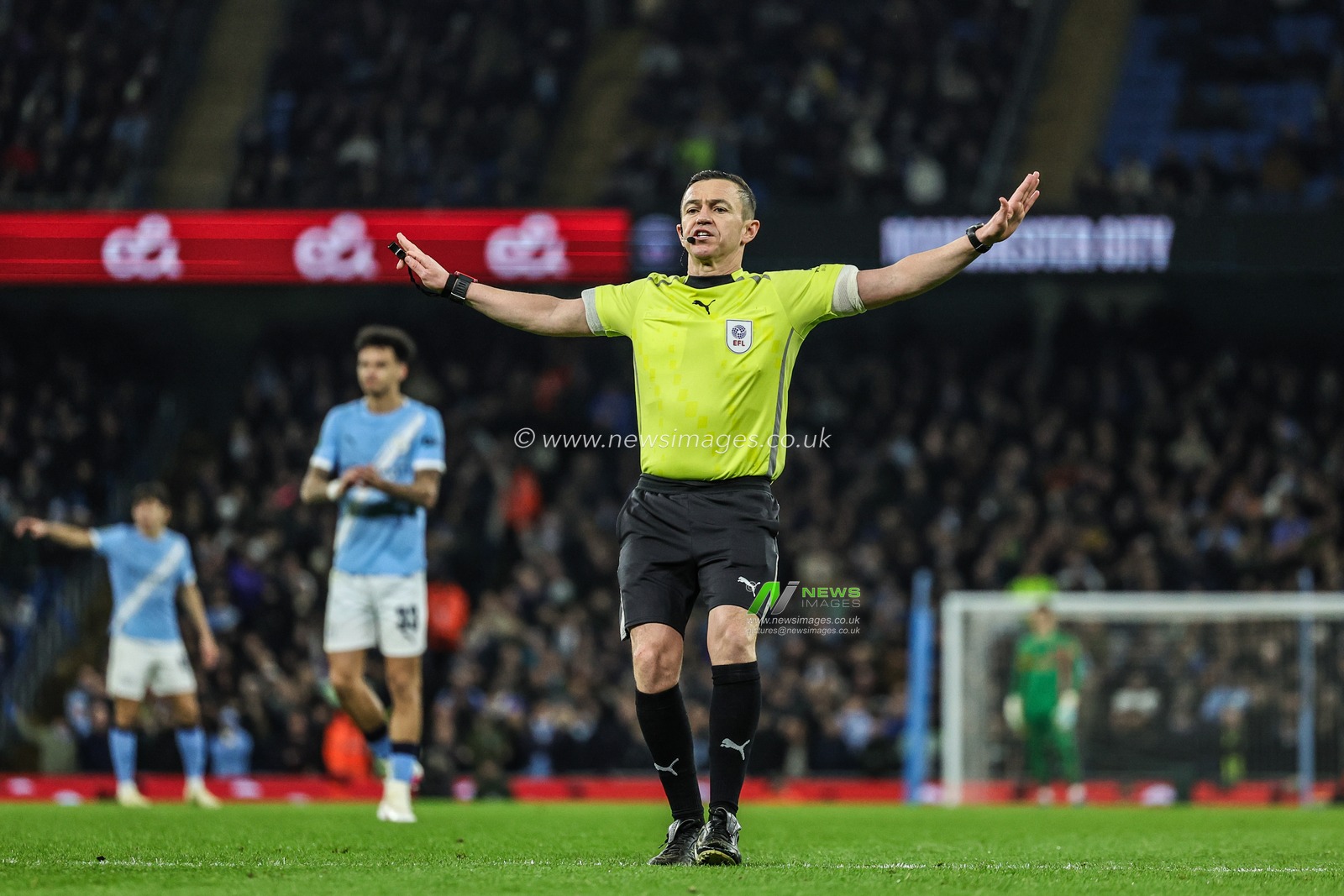 Referee Alejandro Tony Harrington waves away penalty calls during the Carabao Cup Semi-Final second leg match Manchester City vs Newcastle United at Etihad Stadium, Manchester, United Kingdom, 4th February 2026

(Photo by Mark Cosgrove/News Images)