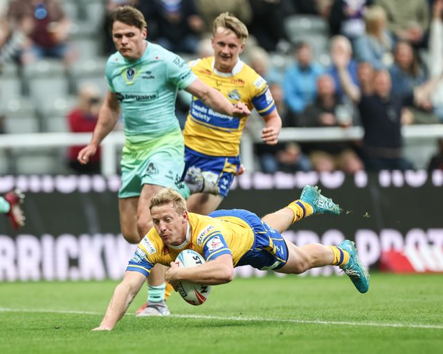 Lachlan Miller of Leeds Rhinos goes over for a try during the Betfred Magic Weekend 2025 match St Helens vs Leeds Rhinos at St. James's Park, Newcastle, United Kingdom, 3rd May 2025

(Photo by Mark Cosgrove/News Images)