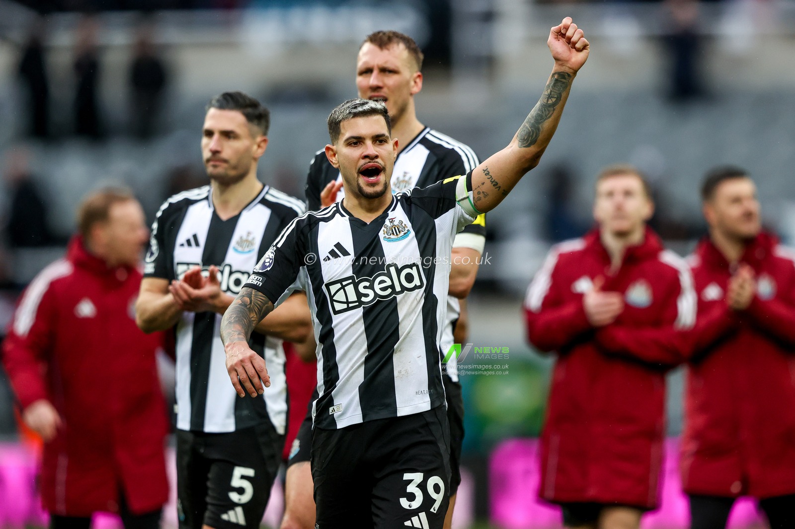 Bruno Guimaraes of Newcastle United celebrates with the fans after the teams victory following the Premier League match Newcastle United vs Nottingham Forest at St. James's Park, Newcastle, United Kingdom, 23rd February 2025

(Photo by Alfie Cosgrove/News Images)