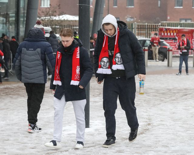 Fans make their way to Anfield in adverse snow and ice conditions during the Premier League match Liverpool vs Manchester United at Anfield, Liverpool, United Kingdom, 5th January 2025

(Photo by Gareth Evans/News Images)