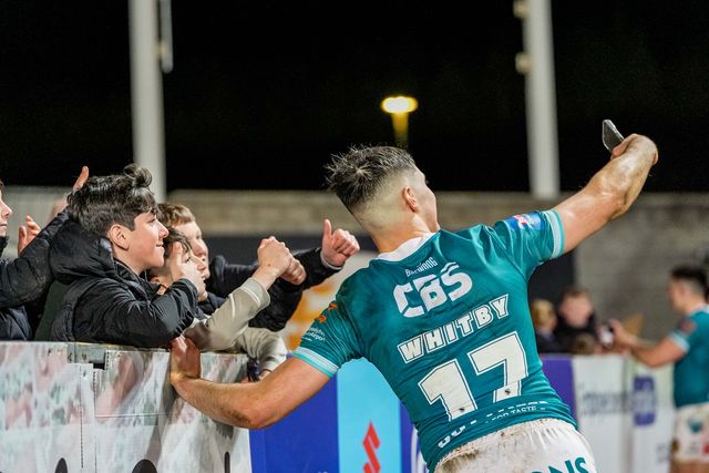 George Whitby of St Helens takes selfies with fans at full time during the Betfred Challenge Cup Quarter Final match St Helens vs Catalans Dragons at The BrewDog Stadium, St Helens, United Kingdom on 10 April 2026

(Photo by Maynard Manyowa/News Images)