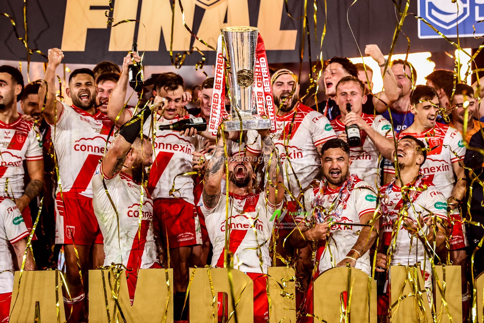 Elliot Minchella of Hull KR lifts the Super League Grand Final Trophy after Hull KR win the Grand Final during the 2025 Betfred Super League Grand Final Hull KR v Wigan Warriors at Old Trafford, Manchester, United Kingdom, 11th October 2025

(Photo by Alfie Cosgrove/News Images)