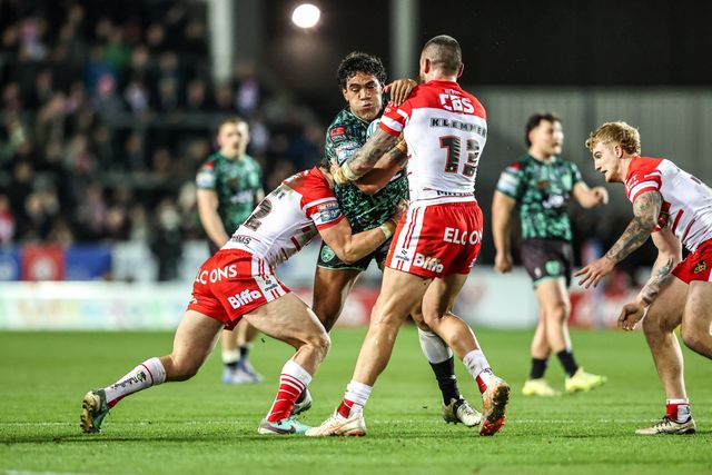 Joe Ofahengaue of Leigh Leopards is tackled by Shane Wright of St Helens and David Klemmer of St Helens during the Betfred Super League match St Helens vs Leigh Leopards at The BrewDog Stadium, St Helens, United Kingdom on 20 February 2026

(Photo by Alfie Cosgrove/News Images)