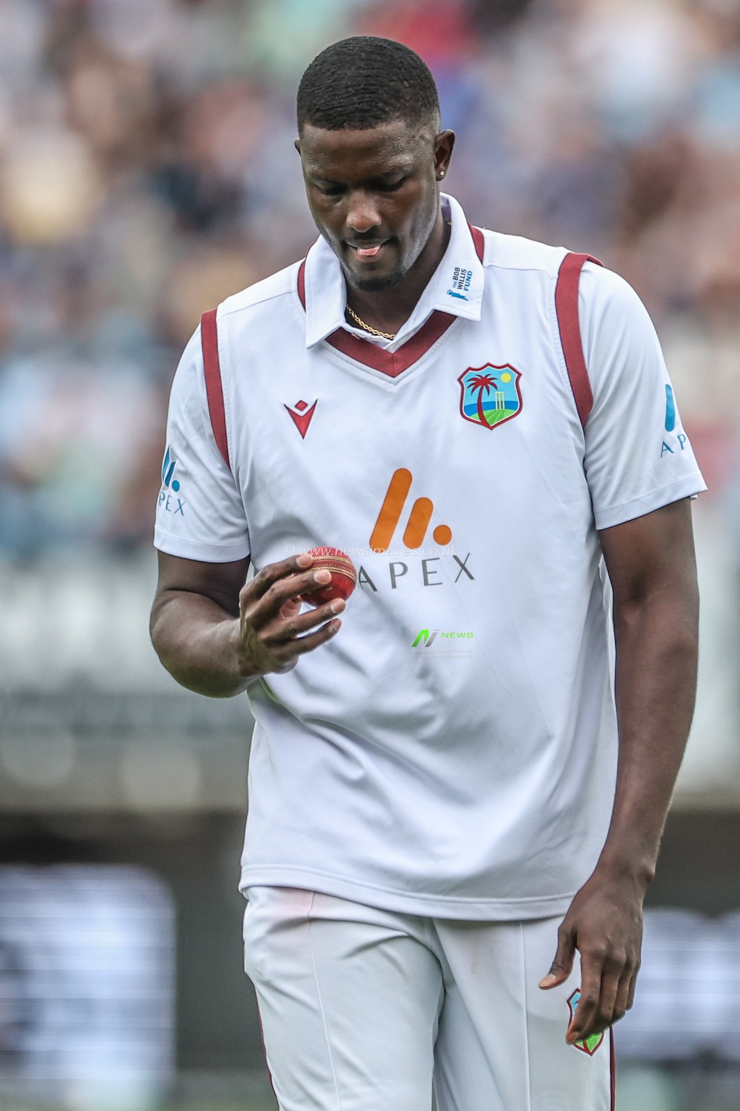Jason Holder of West Indies inspects the ball during Day Two of the Rothesay Test match England vs West Indies at Edgbaston, Birmingham, United Kingdom, 27th July 2024

(Photo by Mark Cosgrove/News Images)