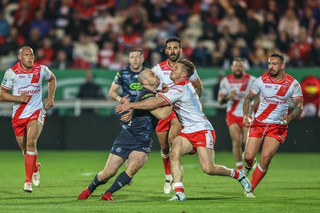 Liam Marshall of Wigan Warriors is tackled by Tom Davies of Hull KR during the Betfred Super League Round 7 match Hull KR vs Wigan Warriors at Sewell Group Craven Park, Kingston upon Hull, United Kingdom, 11th April 2025

(Photo by Alfie Cosgrove/News Images)