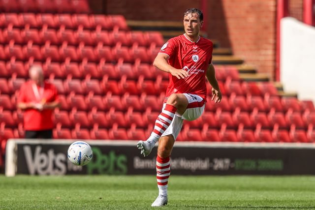Josh Earl of Barnsley passes the ball during the Sky Bet League One match Barnsley vs Bromley at Oakwell, Barnsley, United Kingdom on 15 August 2026

(Photo by Alfie Cosgrove/News Images)