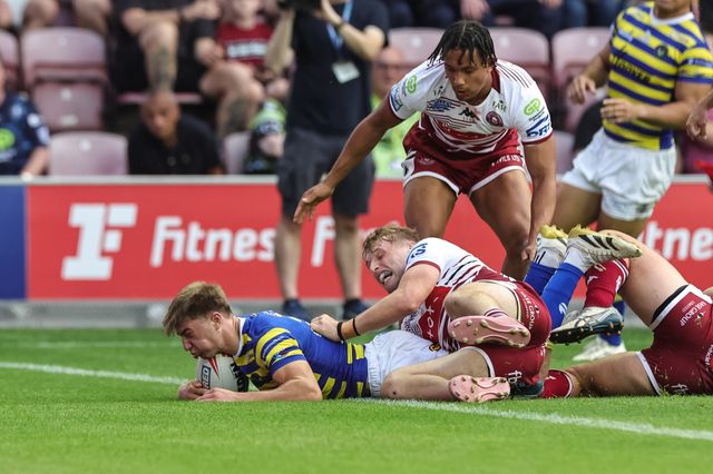 Ewan Irwin of Warrington Wolves goes over for a try during the Betfred Super League round 18 match Wigan Warriors vs Warrington Wolves at The Brick Community Stadium, Wigan, United Kingdom on 10 July 2026

(Photo by Mark Cosgrove/News Images)