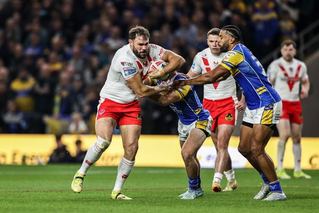 Alex Walmsley of St. Helens is tackled during the Betfred Super League play-off Eliminator 2 match Leeds Rhinos vs St Helens at Headingley Stadium, Leeds, United Kingdom, 27th September 2025

(Photo by Alfie Cosgrove/News Images)