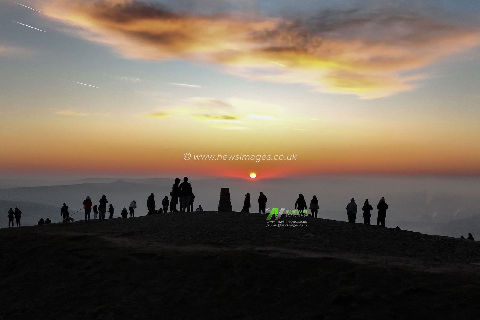 People head to the summit of Mam Tor to watch the sun rise as a blanket of fog lingers over the Hope Valley at Mam Tor, Peak District, United Kingdom, 19th March 2025

(Photo by Mark Cosgrove/News Images)
