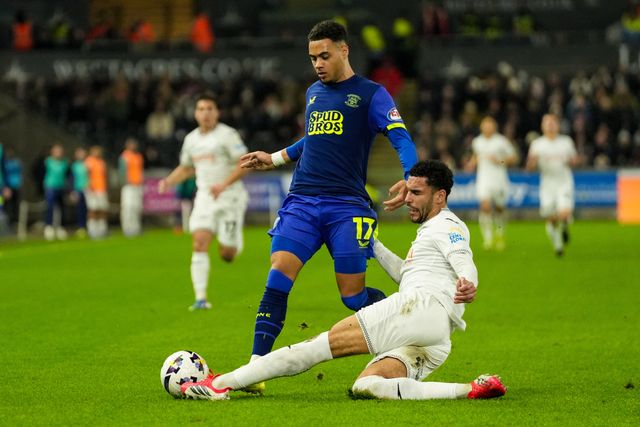 Lewis Dobbin of Preston North End is tackled by Ben Cabango of Swansea City during the Sky Bet Championship match Swansea City vs Preston North End at Swansea.com Stadium, Swansea, United Kingdom on 24 February 2026

(Photo by Andrew Lewis/News Images)
