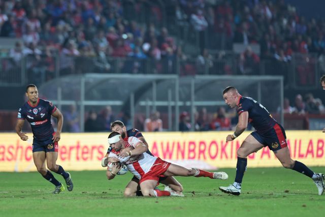 James Batchelor of Hull KR is tackled by Daryl Clark of St. Helens during the Betfred Super League Round 24 match Hull KR vs St Helens at Sewell Group Craven Park, Kingston upon Hull, United Kingdom, 29th August 2025

(Photo by Mark Cosgrove/News Images)