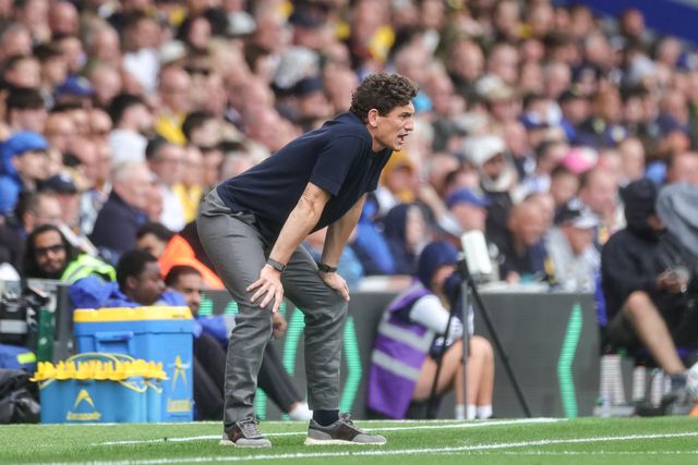 Keith Andrews manager of Brentford crouches as he looks on during the Premier League match Leeds United vs Brentford at Elland Road, Leeds, United Kingdom on 30 August 2026

(Photo by Mark Cosgrove/News Images)