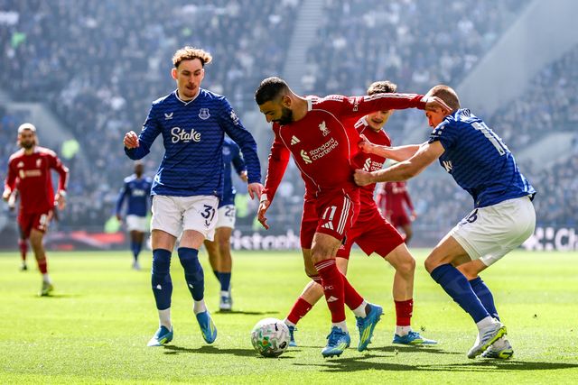 Mohamed Salah of Liverpool holds off Vitaliy Mykolenko of Everton during the Premier League match Everton vs Liverpool at Hill Dickinson Stadium, Liverpool, United Kingdom on 19 April 2026

(Photo by Alfie Cosgrove/News Images)