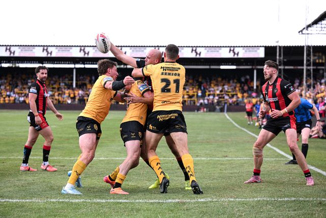 James Harrison of Warrington Wolves under pressure whilst passing the ball during the Betfred Super League round 21 match Castleford Tigers vs Warrington Wolves at OneBore Stadium, Castleford, Untied Kingdom on 01 August 2026

(Photo by Ben Roberts/News Images)
