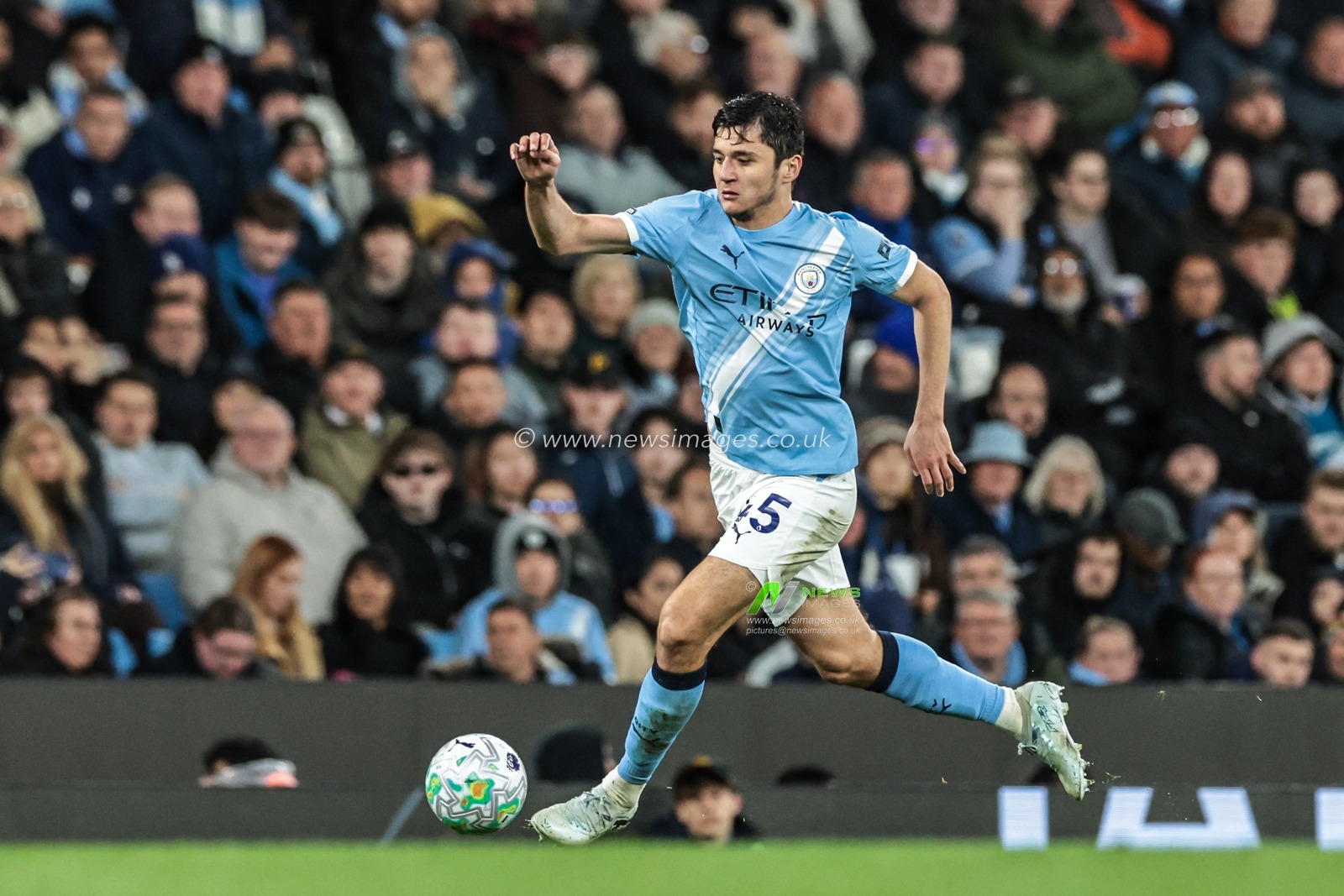 Abdukodir Khusanov of Manchester City breaks with the ball during the Premier League match Manchester City vs Crystal Palace at Etihad Stadium, Manchester, United Kingdom on 13 May 2026

(Photo by Mark Cosgrove/News Images)