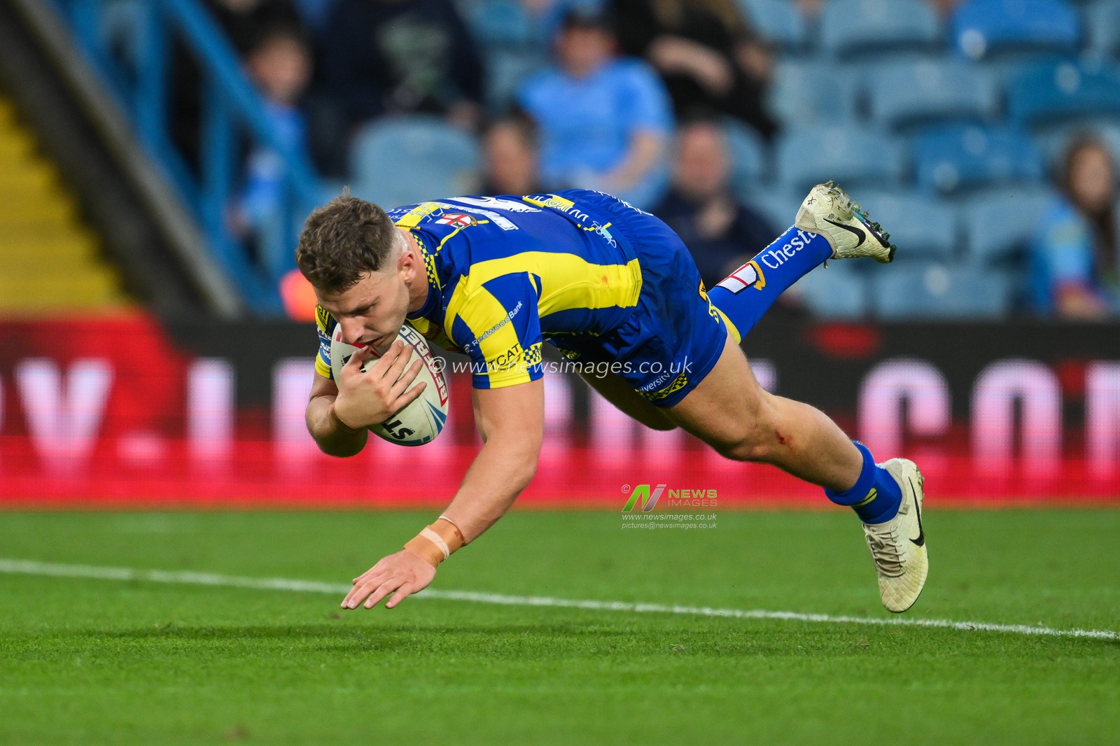 George Williams of Warrington Wolves goes over for a try during the Magic Weekend match Warrington Wolves vs Leeds Rhinos at Elland Road, Leeds, United Kingdom, 17th August 2024

(Photo by Craig Thomas/News Images)