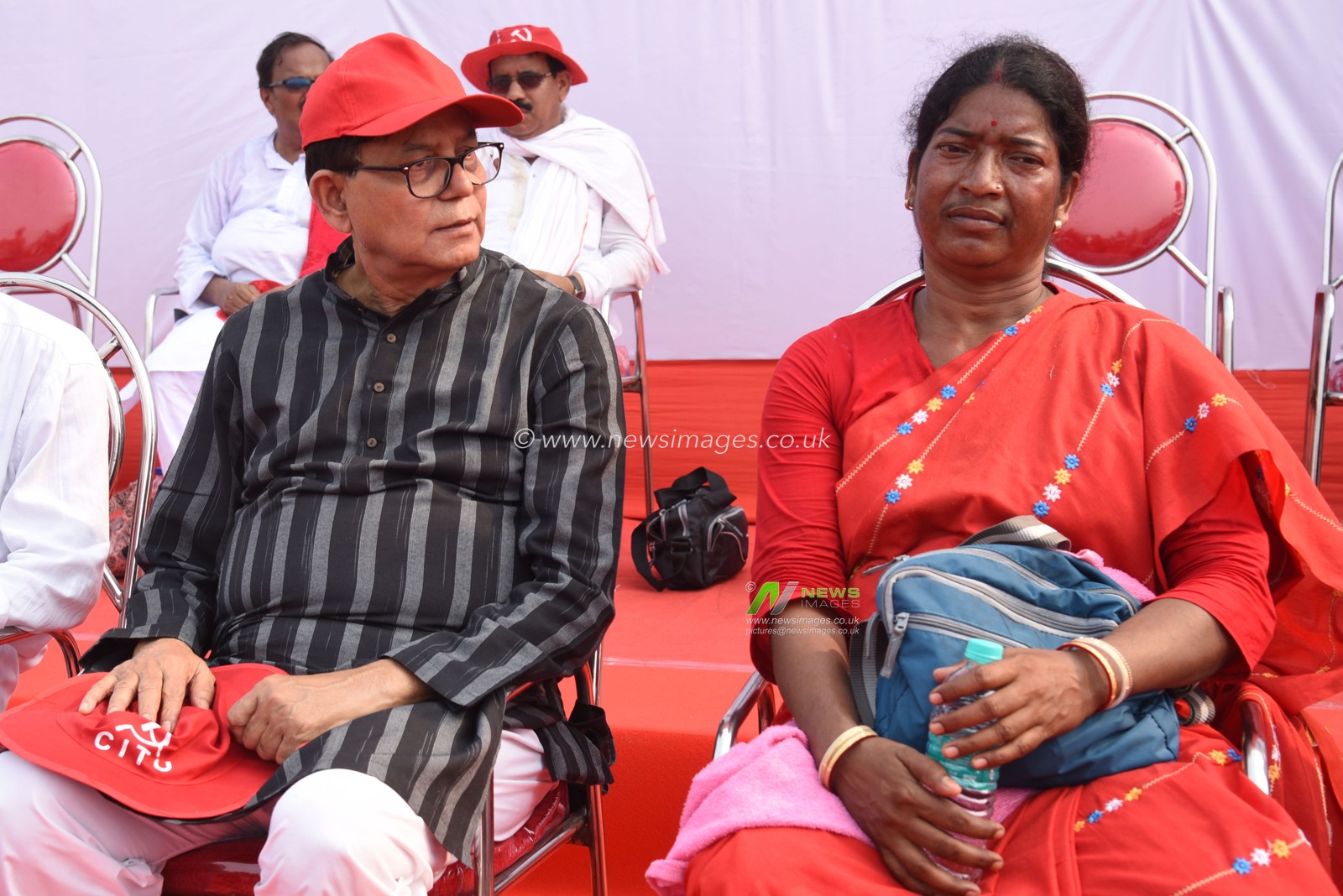 CPI(M) West Bengal State Secretary and Polit Bureau member Md Salim and Tribal Leader Bannya Tudu   at the thousands of farmers, workers, agricultural laborers, and slum dwellers who attend a mass meeting to protest against different labor policies of the state and central government at the Brigade Parade Ground in Kolkata on April 20, 2025. With the battle for the 2026 assembly elections around the corner, CPI(M) state secretary Mohammad Salim, clad in a black kurta, thundered from the podium for a change in the state governance after three consecutive terms of Mamata Banerjee-led Trinamool Congress. Notwithstanding the 'zero' in assembly, the leftists looked more enthusiastic than ever while sounding the poll bugle. "The Supreme Court has rubbed the Chief Minister's nose. RSS is building a base in the state thanks to Mamata Banerjee. Our leaders do not come from Tollygunge," Mohammad Salim attacked Banerjee in his customary challenging tone. Photo by Debajyoti Chakraborty.(Photo: Debajyoti Chakraborty/News Images)